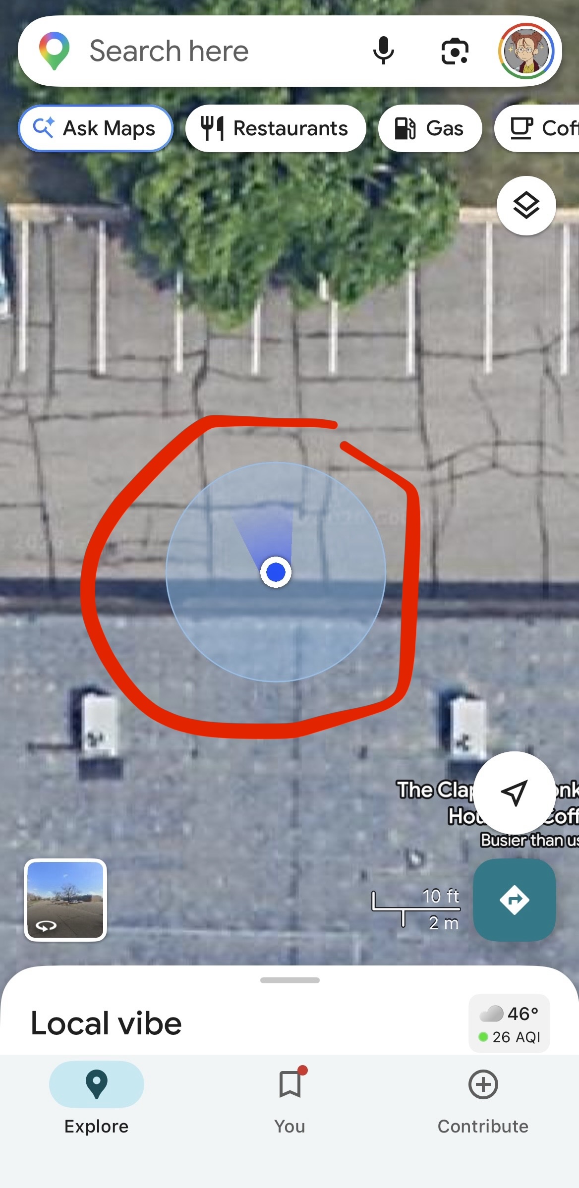 Screenshot of Google Maps showing the current location blue dot, surrounded with a red circle.