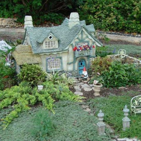 Miniature garden around a miniature house
