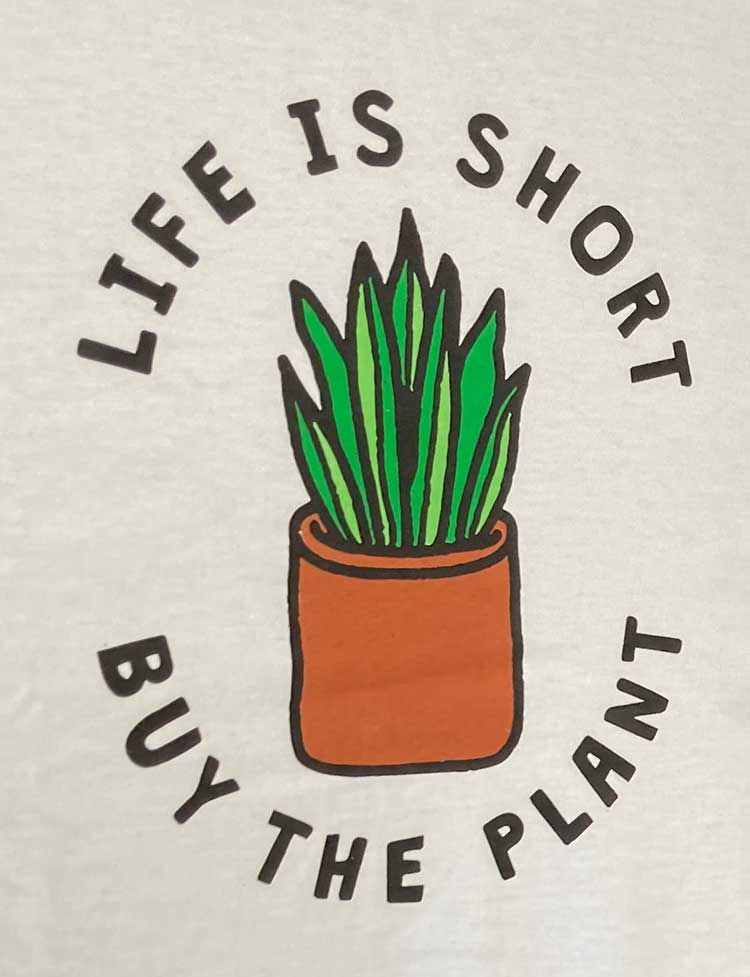 Artwork from a t-shirt that says Life Is Short, Buy the Plant with drawing of a houseplant