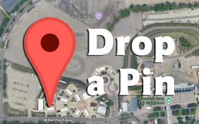 Red map pin with "Drop a Pin" text over a satellite map image