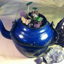 Blue tea pot with stones 