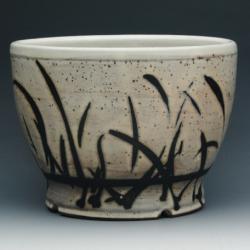 Round ceramic planter bowl with grass motif