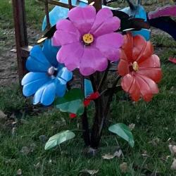 Metal flowers in blue, pink and red