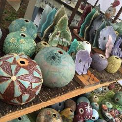 Ceramic globes and irregular shapes in varied colors