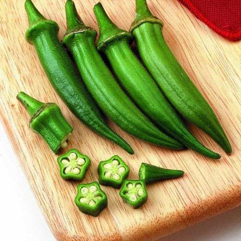 Cajun Delight okra, long green pointed pods